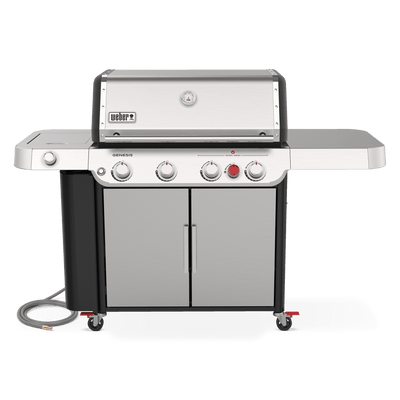 Front view of the stainless steel Weber Genesis S-435 gas grill with a closed lid, built-in thermometer, side shelves, and double-door storage cabinet.