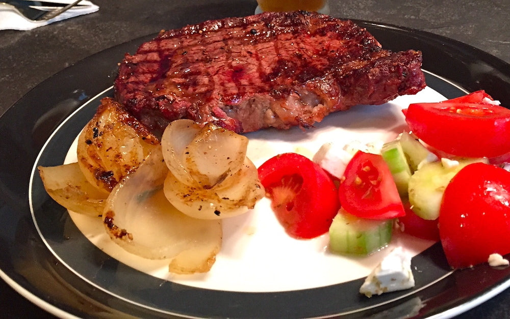 5595657Bef9C4 Holzkopf Side Pairing Photo Melting Onions With Ribeye On The Grill Plated Copy