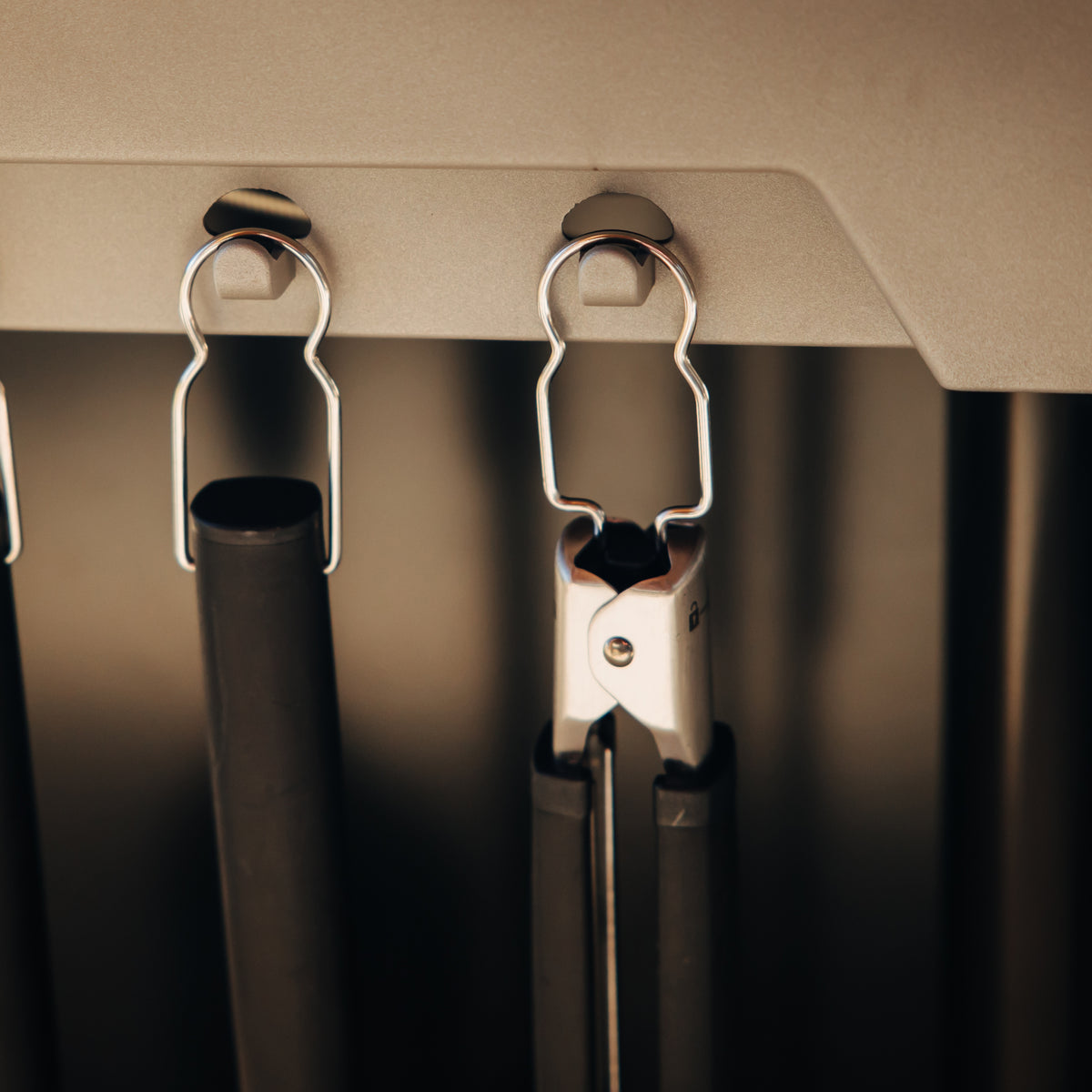 Side table tool hooks keep your tools within reach while cooking.