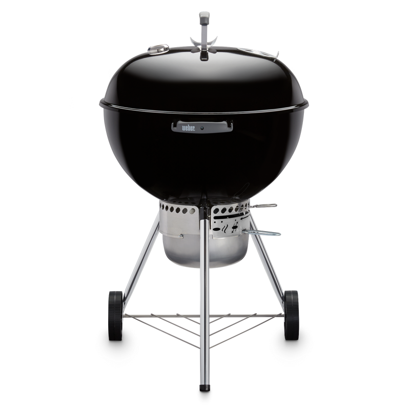 Black Weber 22” Original Kettle Premium charcoal grill with adjustable dampers for heat control and an enclosed ash catcher for cleanup.