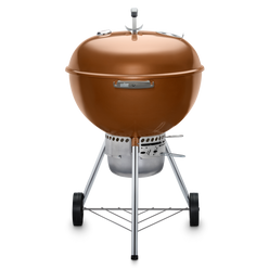 Bronze Weber 22” Original Kettle Premium charcoal grill with adjustable dampers for heat control and an enclosed ash catcher for cleanup.