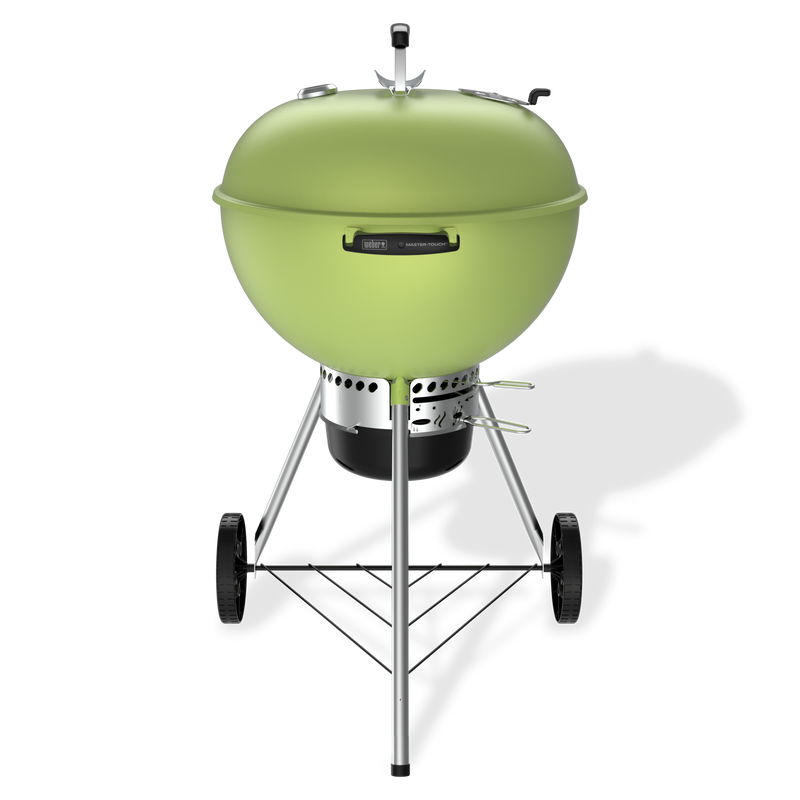 Spring Green 22” Master-Touch Charcoal Grill with a lid, built-in thermometer, enclosed ash catcher, and a lower wire shelf.