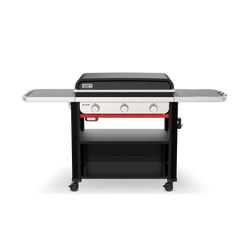 Front view of the Weber Slate 30" Rust-Resistant Griddle with the lid closed, two side tables, three control knobs, and a lower storage shelf.