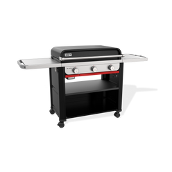 Front-left view of the Weber Slate 30" Rust-Resistant Griddle with the lid closed, two side tables, three control knobs, and a lower storage shelf.