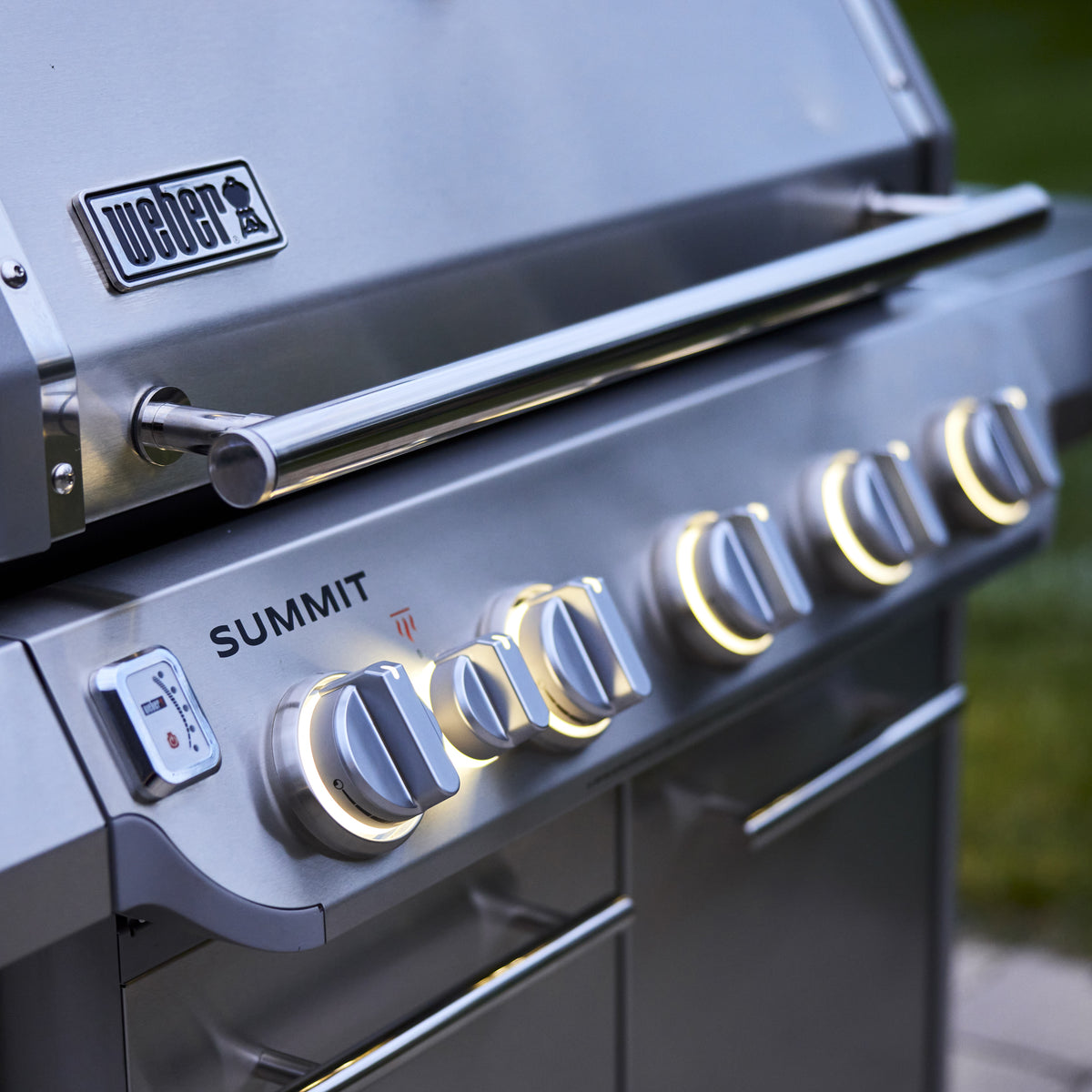 Illuminated control knobs on the Weber Summit FS38 S gas grill make burner settings easier to see when grilling after dark.