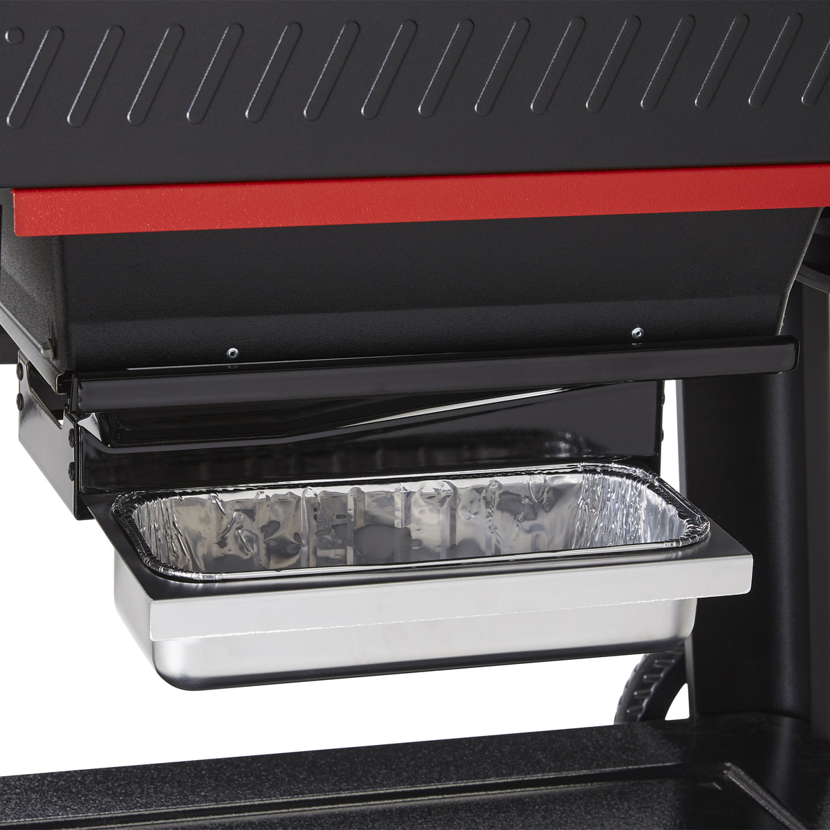 Disposable drip pan (sold separately) collects grease for quick and easy cleanup.