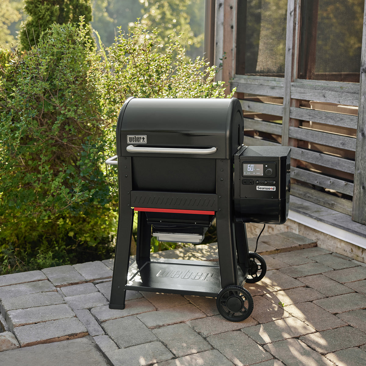 The Weber Searwood 600 pellet grill brings versatile wood-fired cooking to patios and outdoor spaces.