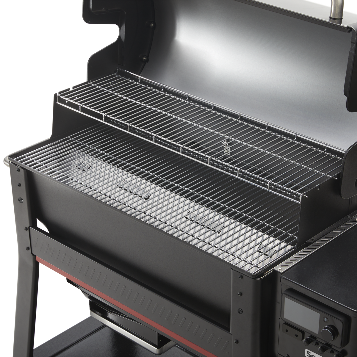 Open Weber Searwood XL 600 wood pellet grill showing the upper and lower cooking grates.