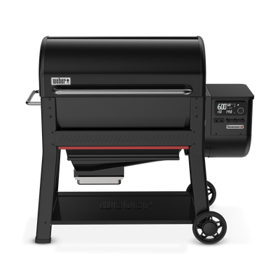Weber Searwood pellet grill in black with digital temperature controls, enclosed lid, side shelf, and wheeled cart. 