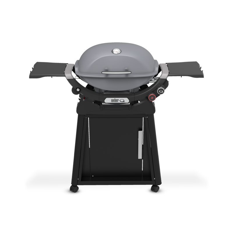 Smoke Gray Gas Grill on a wheeled cart with a closed domed lid, built-in thermometer, extended side tables, two burner control knobs, and a cabinet door.