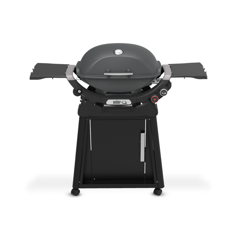 Charcoal Gray Gas Grill on a wheeled cart with a closed domed lid, built-in thermometer, extended side tables, two burner control knobs, and a cabinet door.