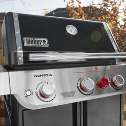Built-in lid thermometer on the Weber Genesis E-325W Titanium Edition gas grill lets you monitor cooking temperature without opening the lid.
