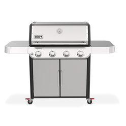 Front view of the stainless steel Weber Genesis S-415 Gas Grill with the lid closed, four burner controls, and two side shelves for prep and serving.