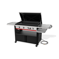 Front-right view of the Weber Slate 36” Rust-Resistant Griddle with the hard cover open, an empty cooktop and the flip-up side table extended for extra workspace.