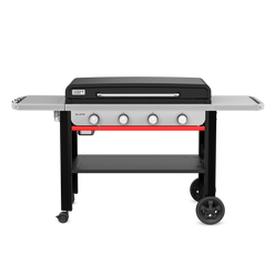 The Weber Slate 36” Rust-Resistant Griddle features four control knobs, two spacious side tables, and an open cart with a storage shelf, caster wheels, and large wheels for mobility.