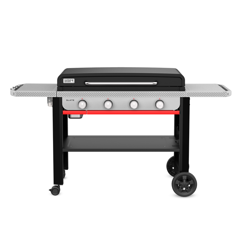 The Weber Slate 36” Rust-Resistant Griddle features four control knobs, two spacious side tables, and an open cart with a storage shelf, caster wheels, and large wheels for mobility.
