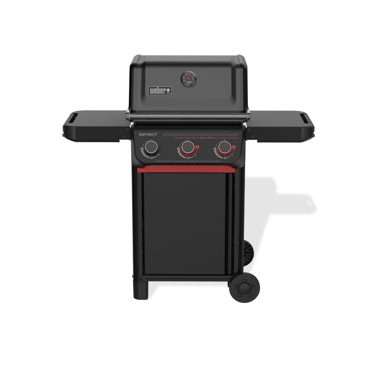 Front view of a matte black gas grill with a closed lid, built-in thermometer, three control knobs, red accents, two side shelves, and large wheels.