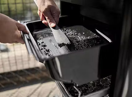 Grease Management System with removable grease tray that slides out for quick and easy cleaning and maintenance.