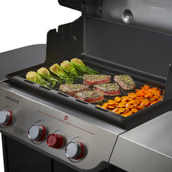 Weber Rust-Resistant Griddle Insert sears sesame-crusted tuna while bok choy and sliced carrots cook alongside for a complete meal.