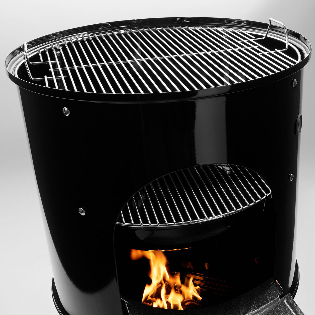 The two cooking grates provide ample room for smoking multiple large items, such as a turkey and two layers of ribs, at once. 