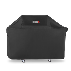 Weather-resistant Weber Premium Grill Cover shields Genesis 3-burner gas grills from rain and snow between cooks.