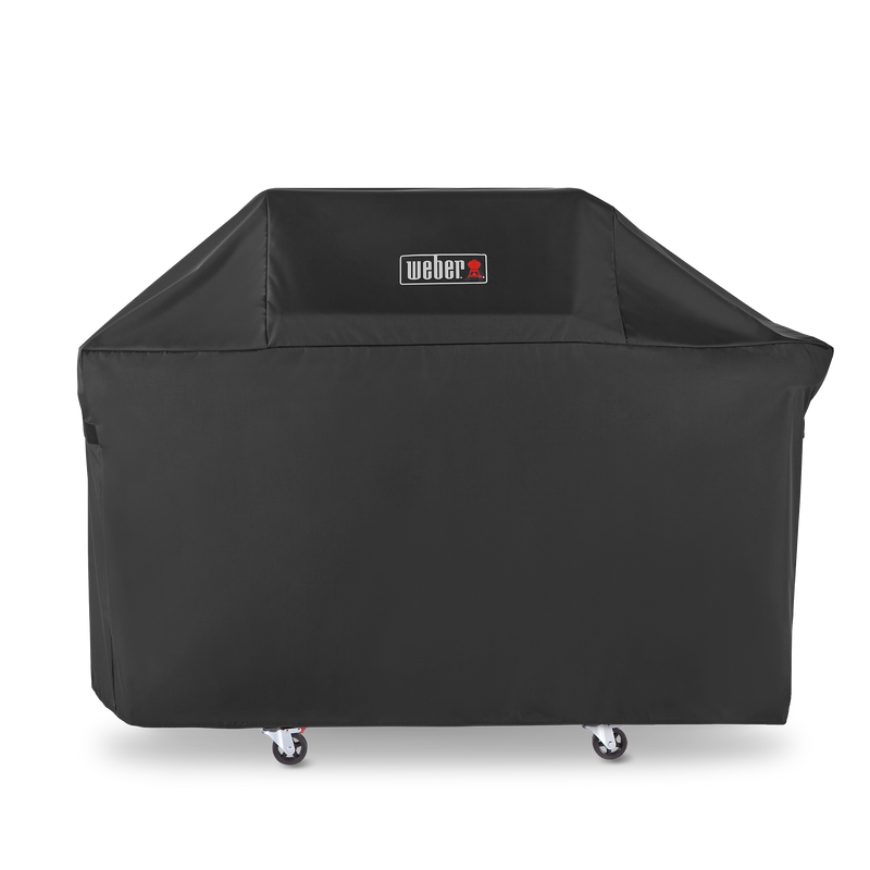 Weather-resistant Weber Premium Grill Cover shields Genesis 3-burner gas grills from rain and snow between cooks.