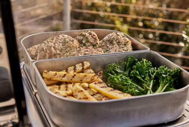Keep food warm so guests can help themselves to seconds, enjoying buffet-style self-service. This 4-piece Versatility Expansion Kit also expands your grill's steam and smoke functionality across the entire cooking surface. 