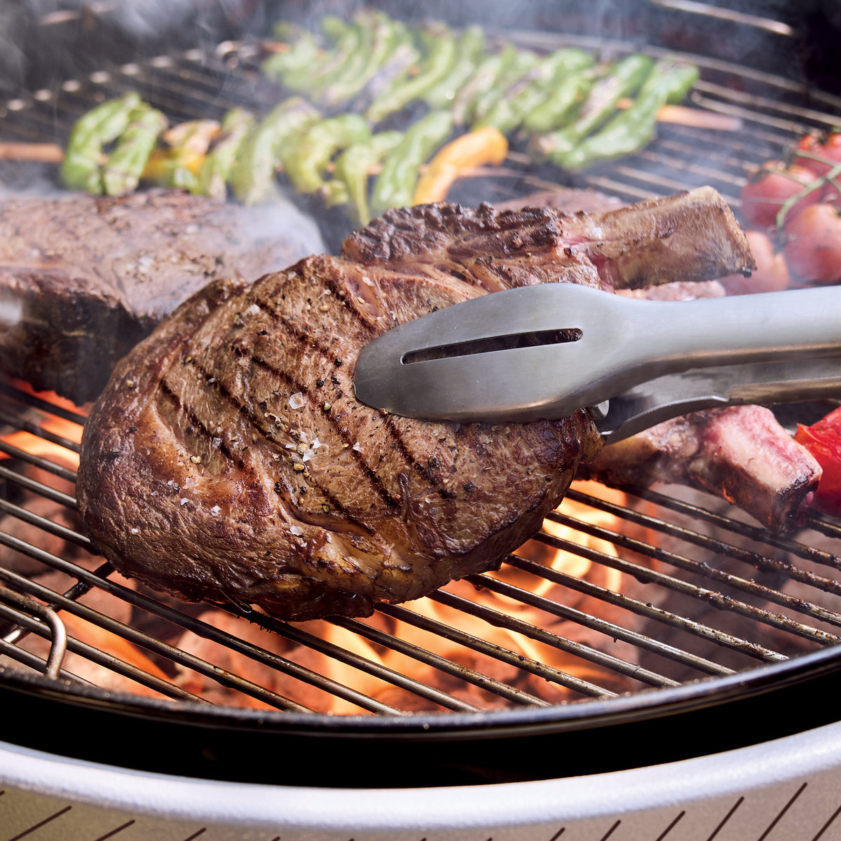 Weber Performer 22” Charcoal Grill delivers high-heat charcoal grilling for searing steaks and other cookout favorites.