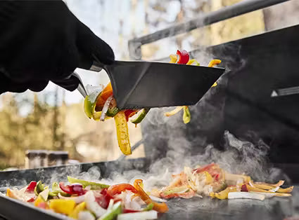 Rust-resistant carbon-steel cooktop has been transformed under extreme heat and pressure that case hardens the surface, reducing the ability for rust to form. No use of coatings means you can use metal tools to flip, press, and scrape without worry.