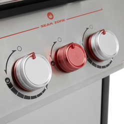 A red sear burner knob sits between two silver burner controls beneath the Sear Zone label.