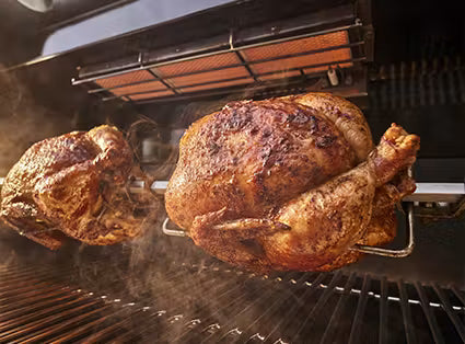 Heavy-duty, integrated rotisserie (included) rotates multiple large cuts of meat under the top-down infrared broiler to crisp and brown evenly while locking in juices.