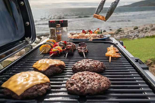 Cook at low or high temperatures to sear steaks and grill juicy chicken. 