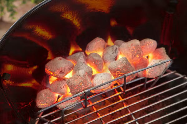 Included Char-Rails make it easy to arrange charcoal for direct or indirect cooking by simply moving the rails closer together or further apart. 